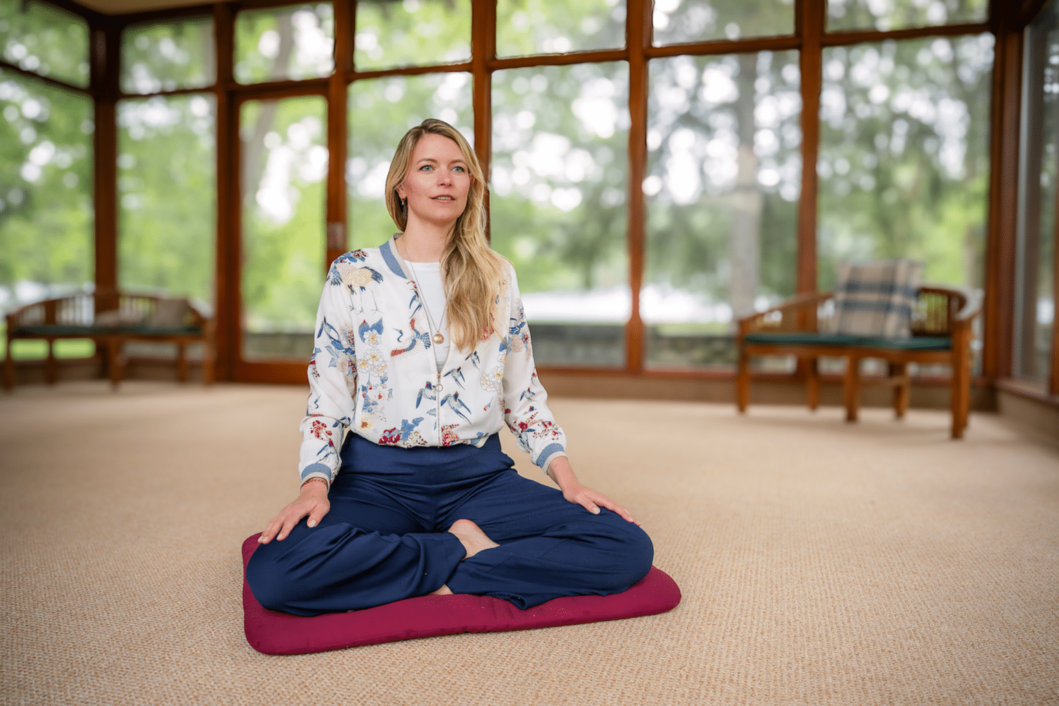 Woman meditating inside